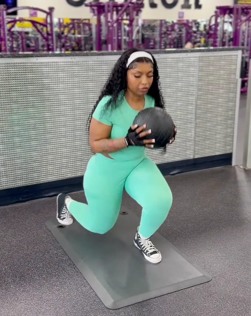Client training with a medicine ball
