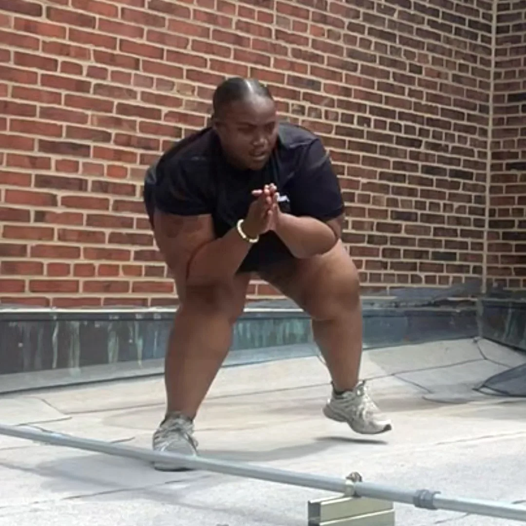 Client completing an outdoor lateral lunge