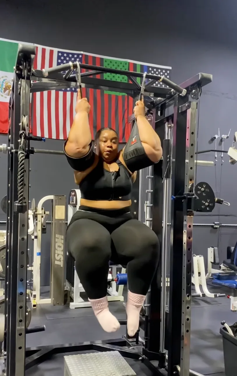 Client performing a hanging core exercise